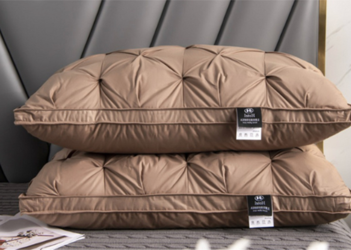 Premium goose down pillow for superior neck support, hypoallergenic comfort, and luxurious, restful sleep.