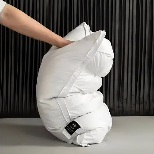Soft, hypoallergenic goose down pillow, a luxury bedding essential for ultimate comfort and restful sleep.
