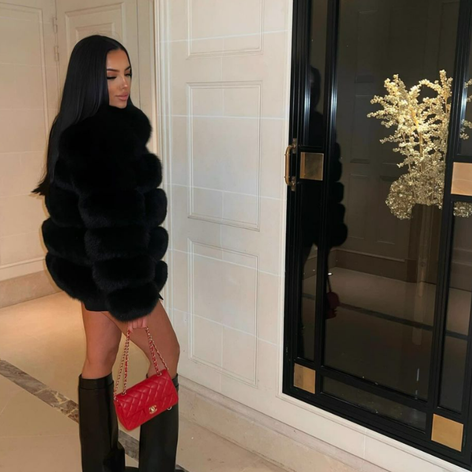 Soft faux fur women's jacket. A luxurious and stylish addition to any ladies' winter outerwear collection.