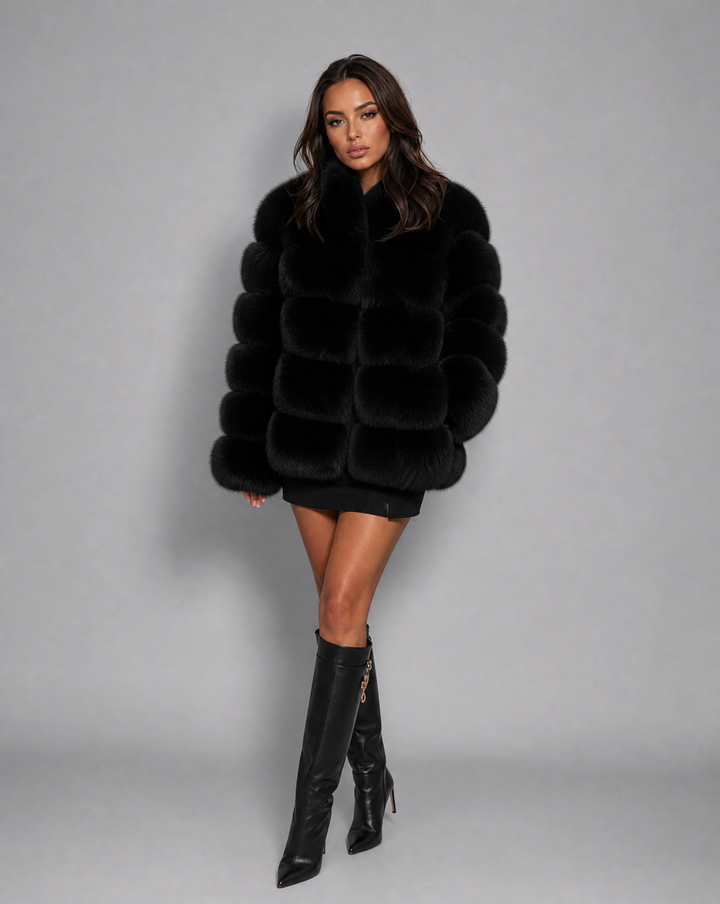 Plush women's faux fur jacket, featuring a soft texture, ideal for elegant cold weather and stylish outerwear.