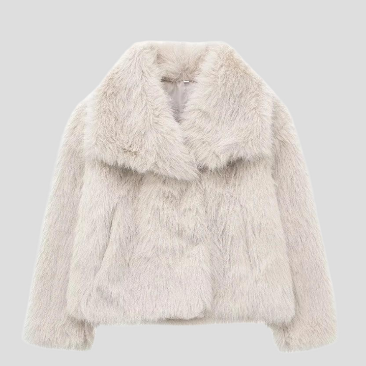 Stylish women's plush winter coat, ideal for cold weather. Features a soft texture, elegant design, and luxury fashion look.
