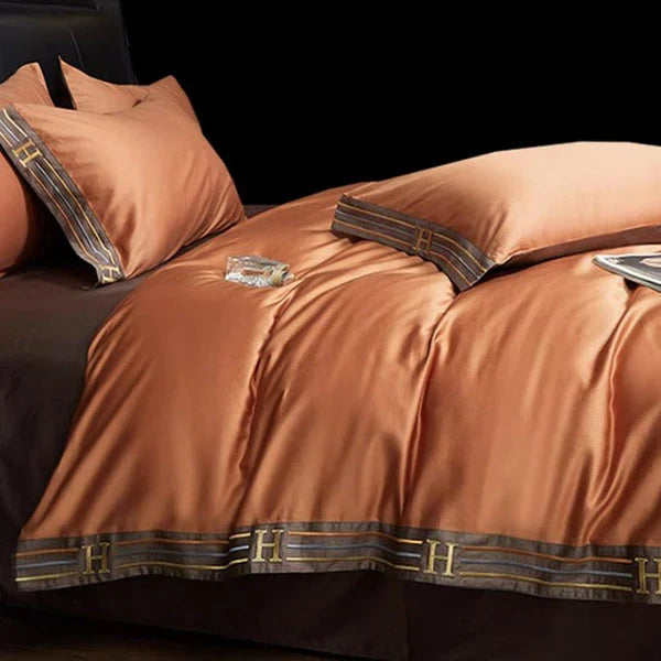 Indulge in elegant sleep with this luxury embroidered soft cotton sheet & duvet cover set.