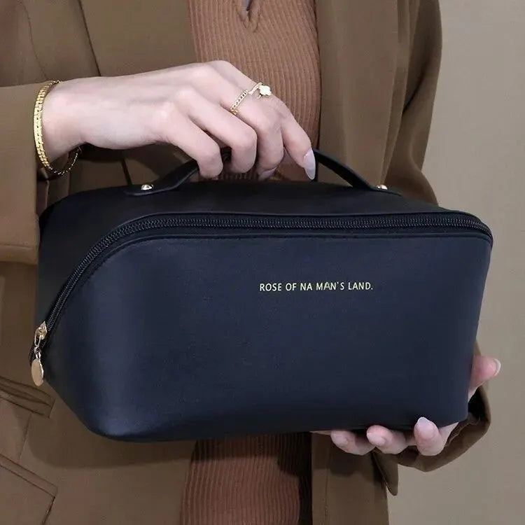 Sophisticated women's travel toiletry organizer, zippered for security.