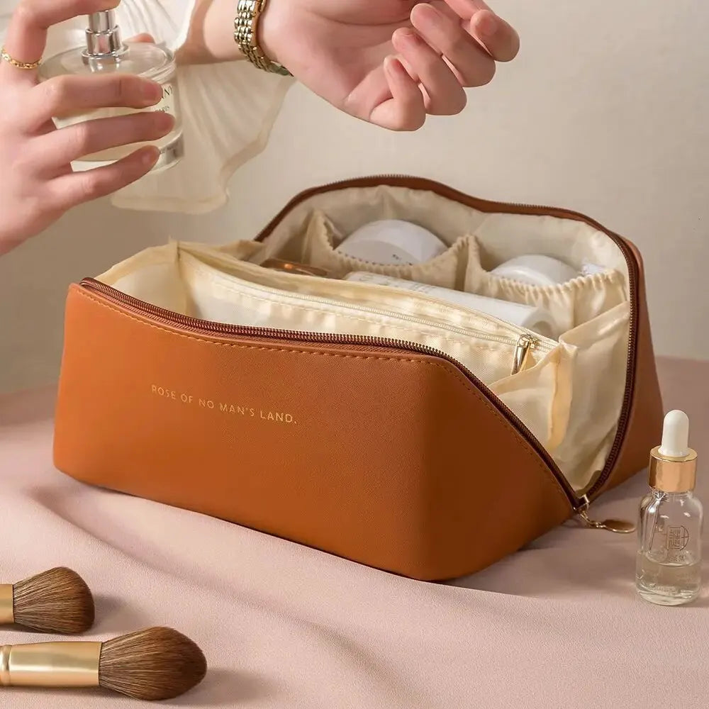 Elegant PU leather travel makeup pouch with secure zipper closure.