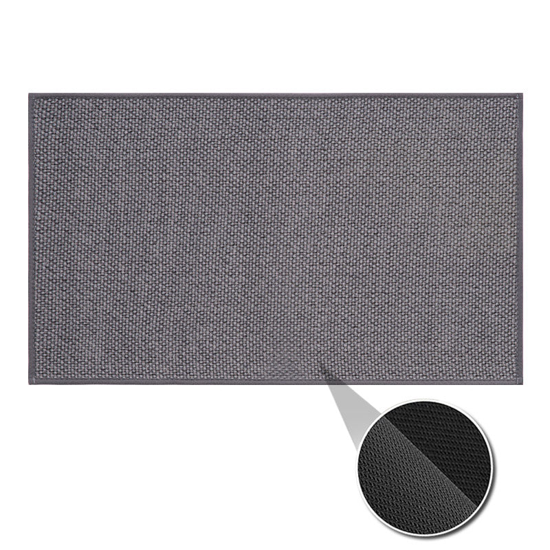 Machine washable woven indoor door mat with a timeless weave pattern, non-slip backing, and plush polypropylene surface.