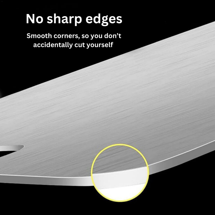 Medical grade titanium cutting board with non-porous silver surface, rounded edges, and ergonomic design for ultimate hygiene