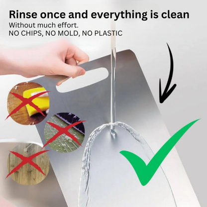 Medical grade titanium cutting board with non-porous silver surface, rounded edges, and ergonomic design for ultimate hygiene