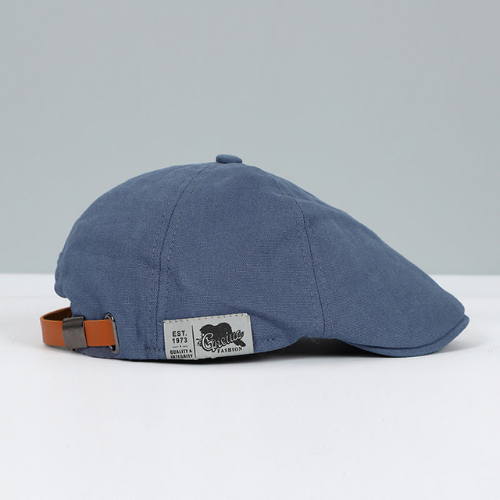 Man wearing a stylish modern adjustable beret hat, showcasing its elegant fit & fashion appeal. Versatile headwear.