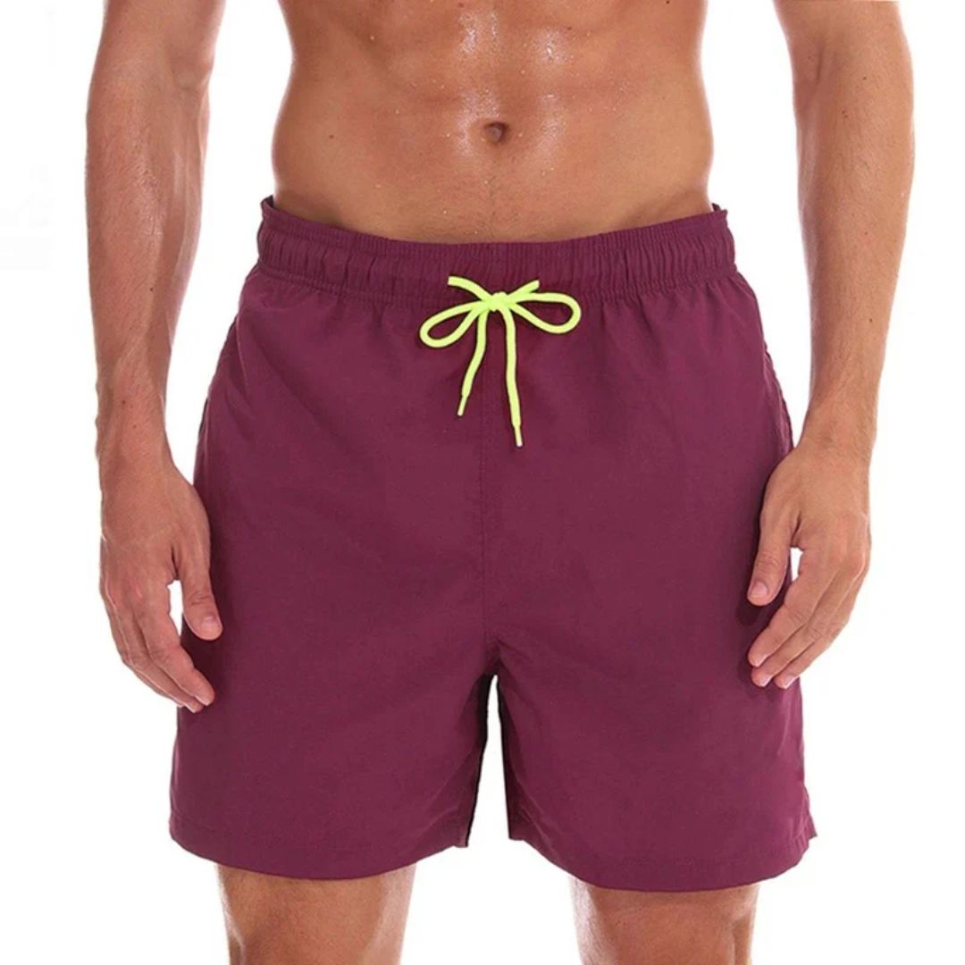 Men's summer drawstring swim shorts with side pockets. Perfect casual beachwear & comfortable swimwear for warm weather.