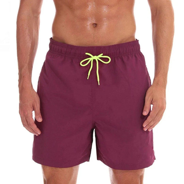 Men's summer drawstring swim shorts with side pockets. Perfect casual beachwear & comfortable swimwear for warm weather.