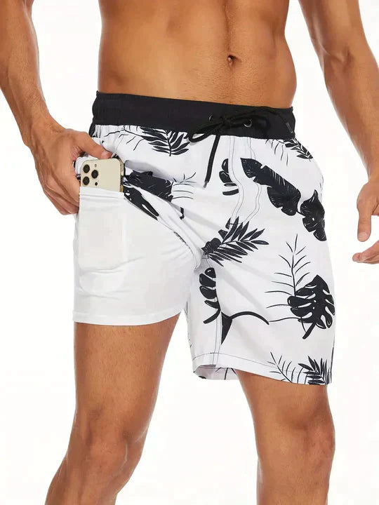 Front view of men's quick-dry printed swim shorts, featuring a comfortable drawstring waist for summer fashion.