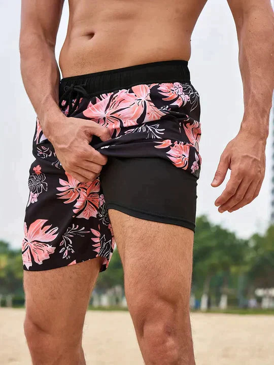 Close-up of the adjustable drawstring waist on men's patterned swim shorts, designed for ultimate comfort.