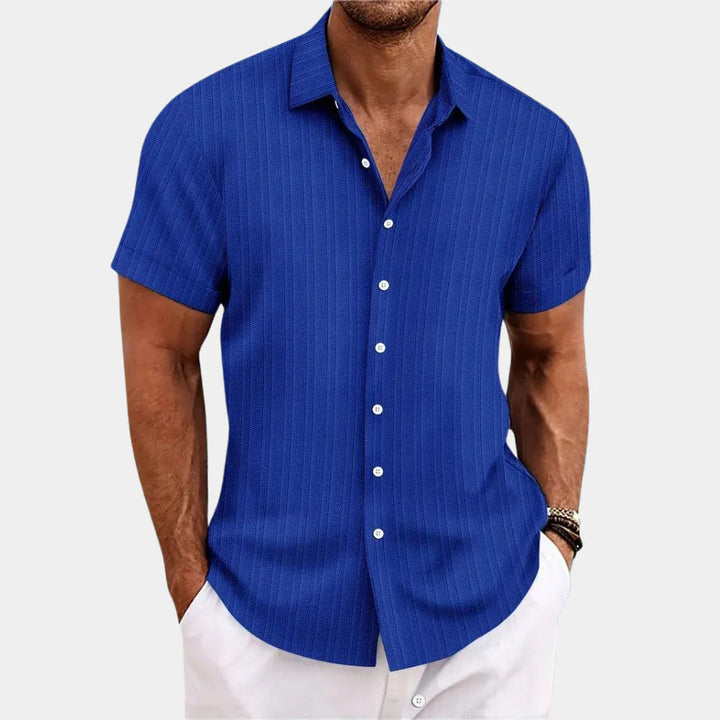 Men's breathable short-sleeve casual button-up shirt in a regular fit for summer comfort.