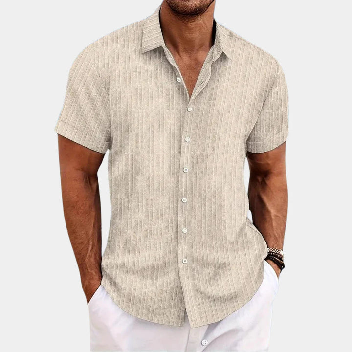Stylish men's casual summer shirt. Breathable, short-sleeve button-up top for everyday wear.
