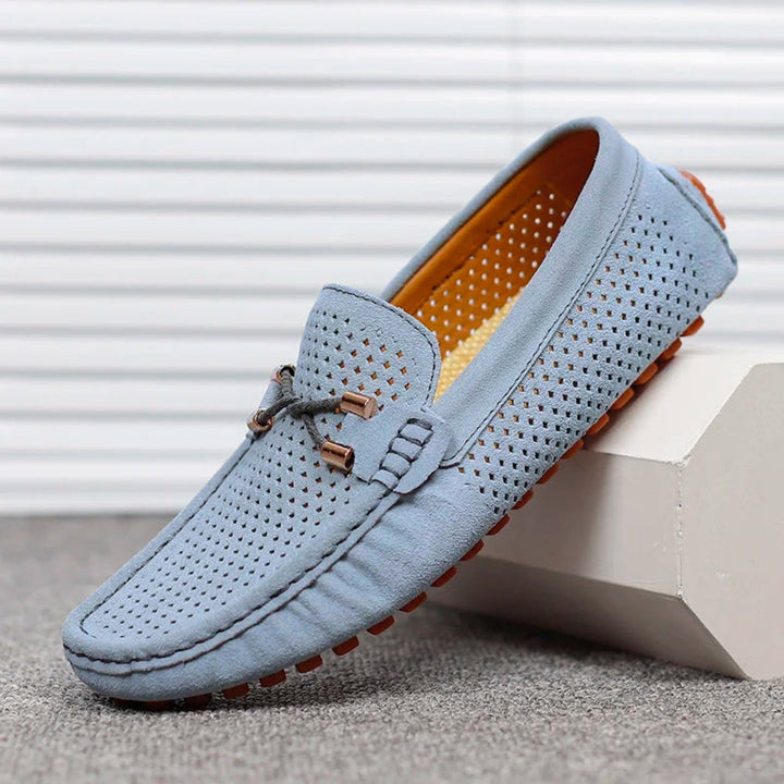Close-up of comfortable men's slip-on loafers, highlighting plush interior for all-day casual wear.