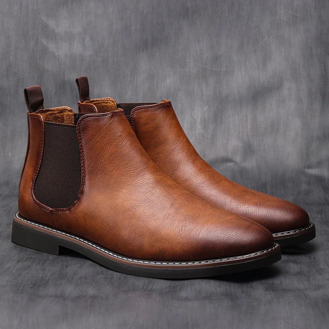 Men's classic black Chelsea boots. Stylish slip-on footwear for smart casual and everyday comfort.