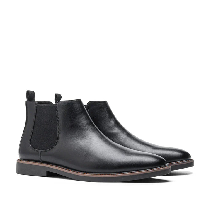 Classic light brown leather men's Chelsea boots. Versatile slip-on footwear for casual & smart outfits.
