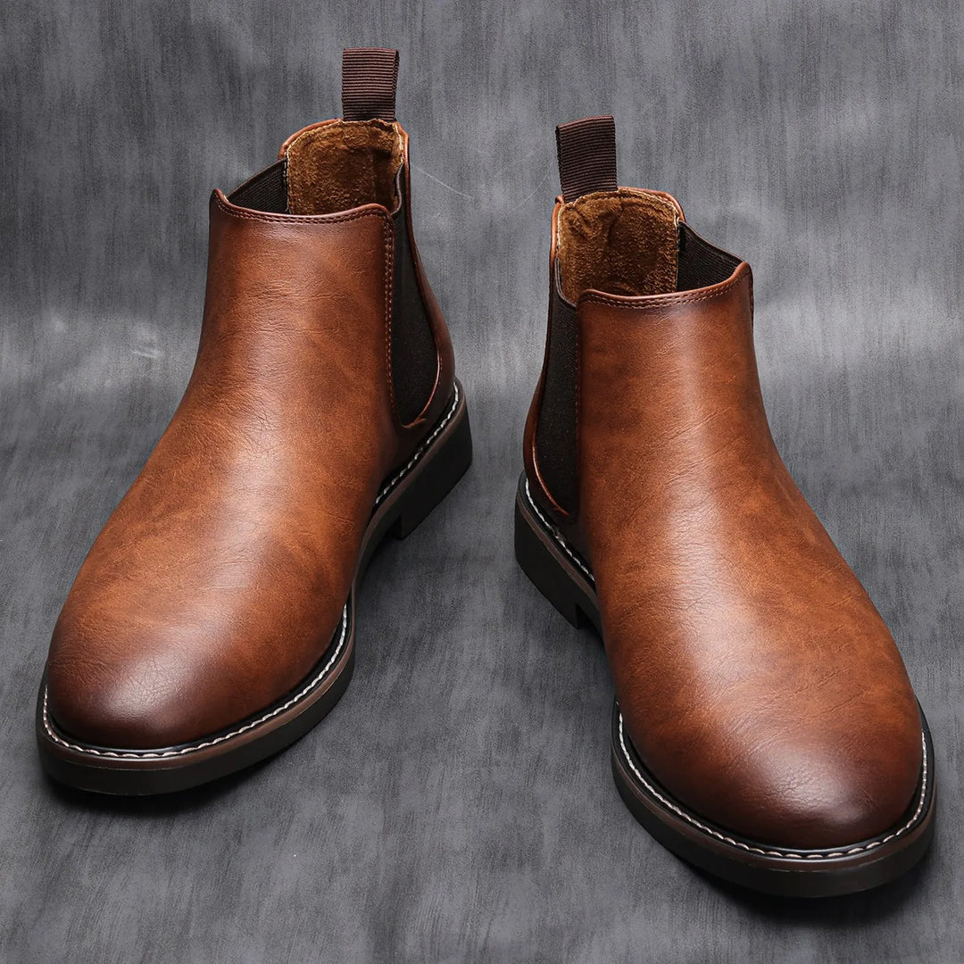Comfortable dark brown leather Chelsea boots for men. Versatile slip-on casual and work footwear.