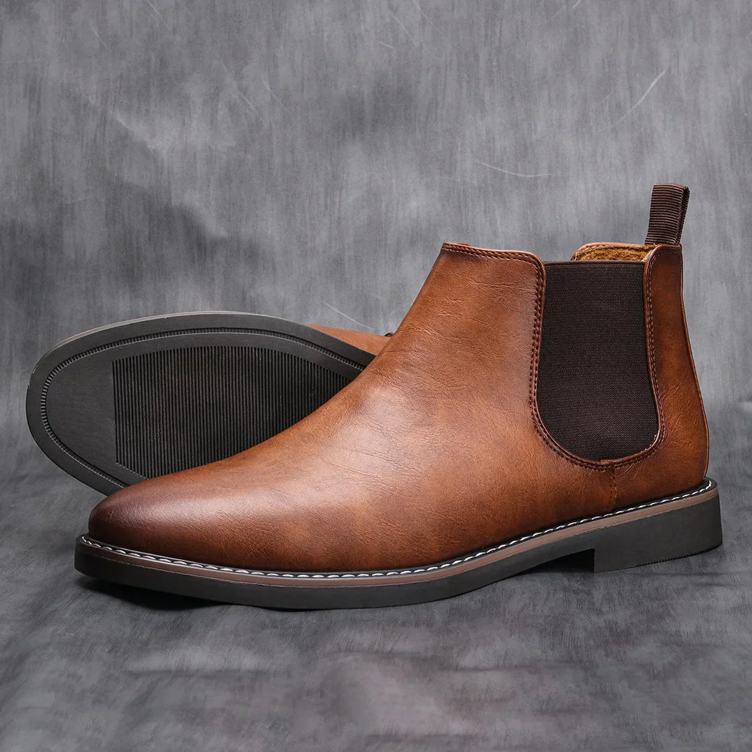 Modern grey suede Chelsea boots for men. Smart casual slip-on footwear, perfect for everyday style.