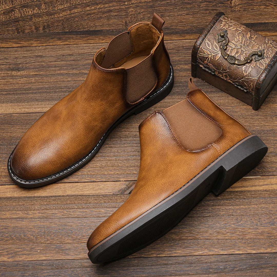 Trendy men's black Chelsea boots. Essential slip-on footwear for contemporary men's fashion & style.