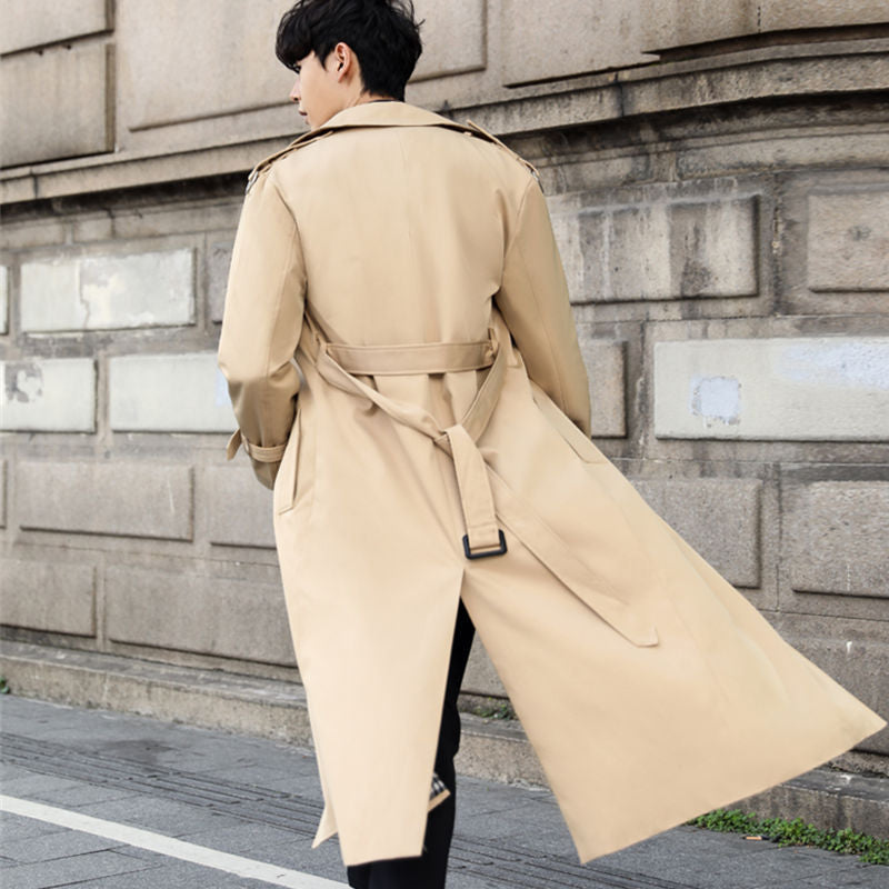Stylish men's khaki double-breasted long trench coat with belt, ideal fall fashion & classic outerwear.
