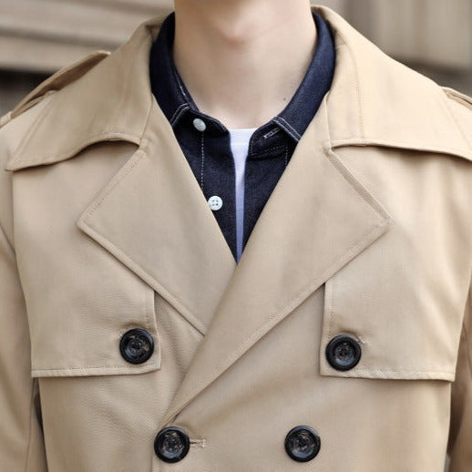 Elegant men's black double-breasted long trench coat, a sophisticated winter coat for classic mens fashion.
