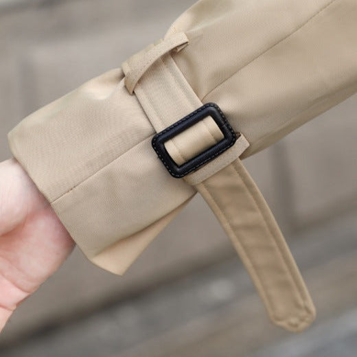 Long men's double-breasted trench coat with a belted waist, essential classic fall & winter outerwear.