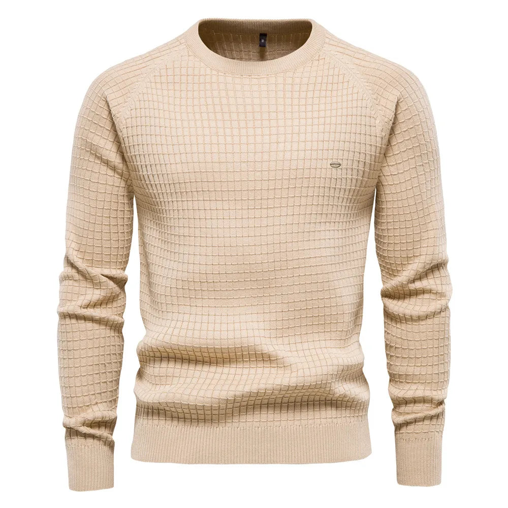 Close-up of soft knit fabric on a Felix men's crewneck jumper. Perfect for cozy winter fashion & comfort.