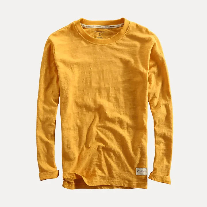 Solid color men's long sleeve crew neck shirt, a timeless pullover for versatile casual fashion.