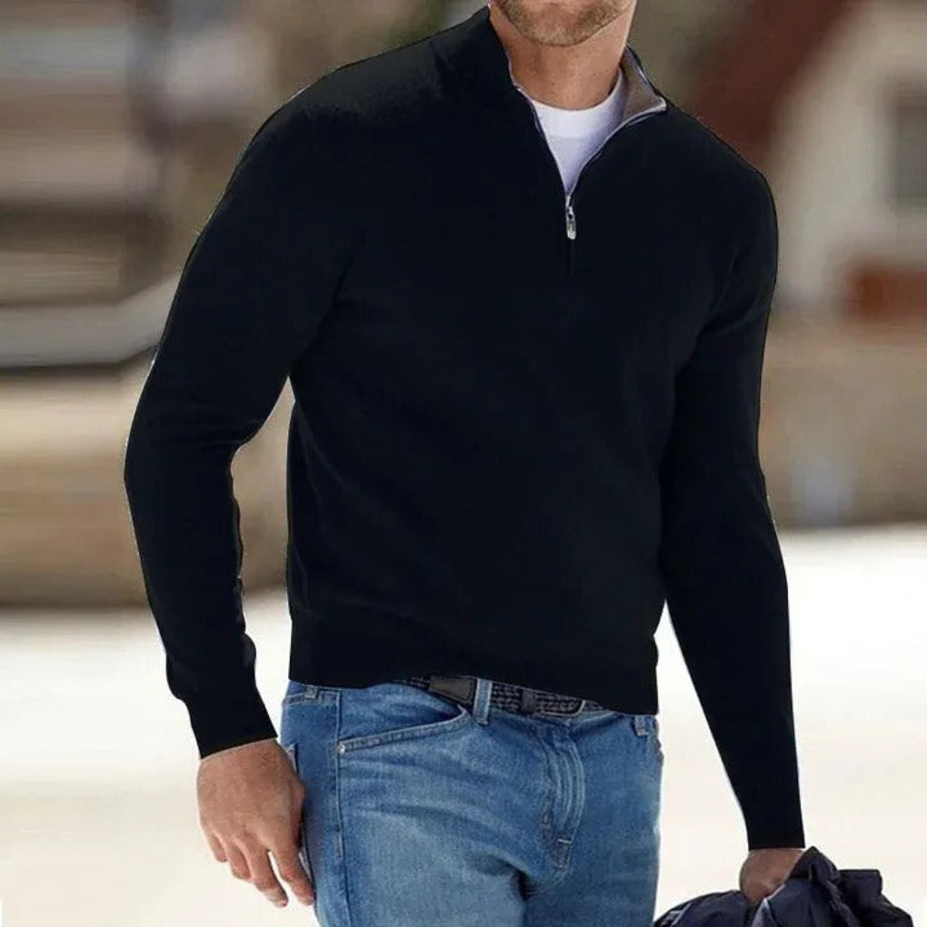 Soft knitted men's quarter-zip sweater, a classic pullover offering warmth and smart everyday style.