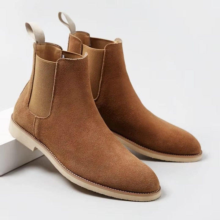 Modern men's slip-on Chelsea boots, ideal for fall fashion, with a clean minimalist design for versatile wear.