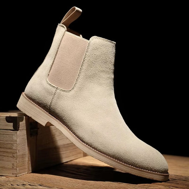 Versatile men's classic Chelsea ankle boots with easy slip-on feature, suitable for both casual and dress events.