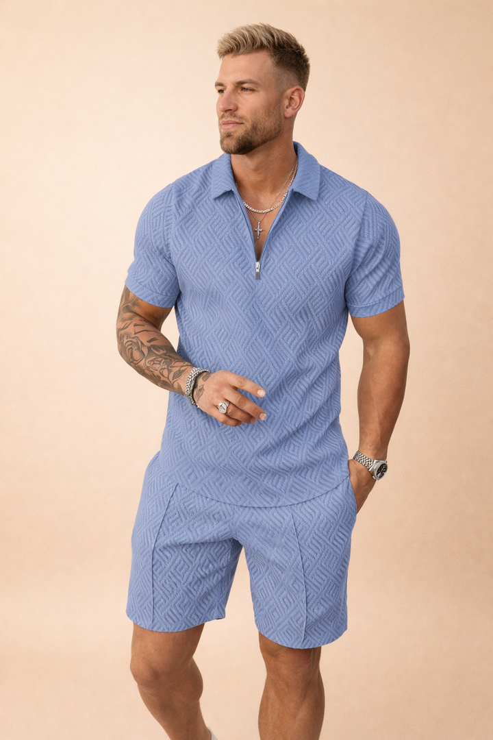 Complete men's summer outfit: collared polo shirt and tailored shorts set, great for vacation or casual style.