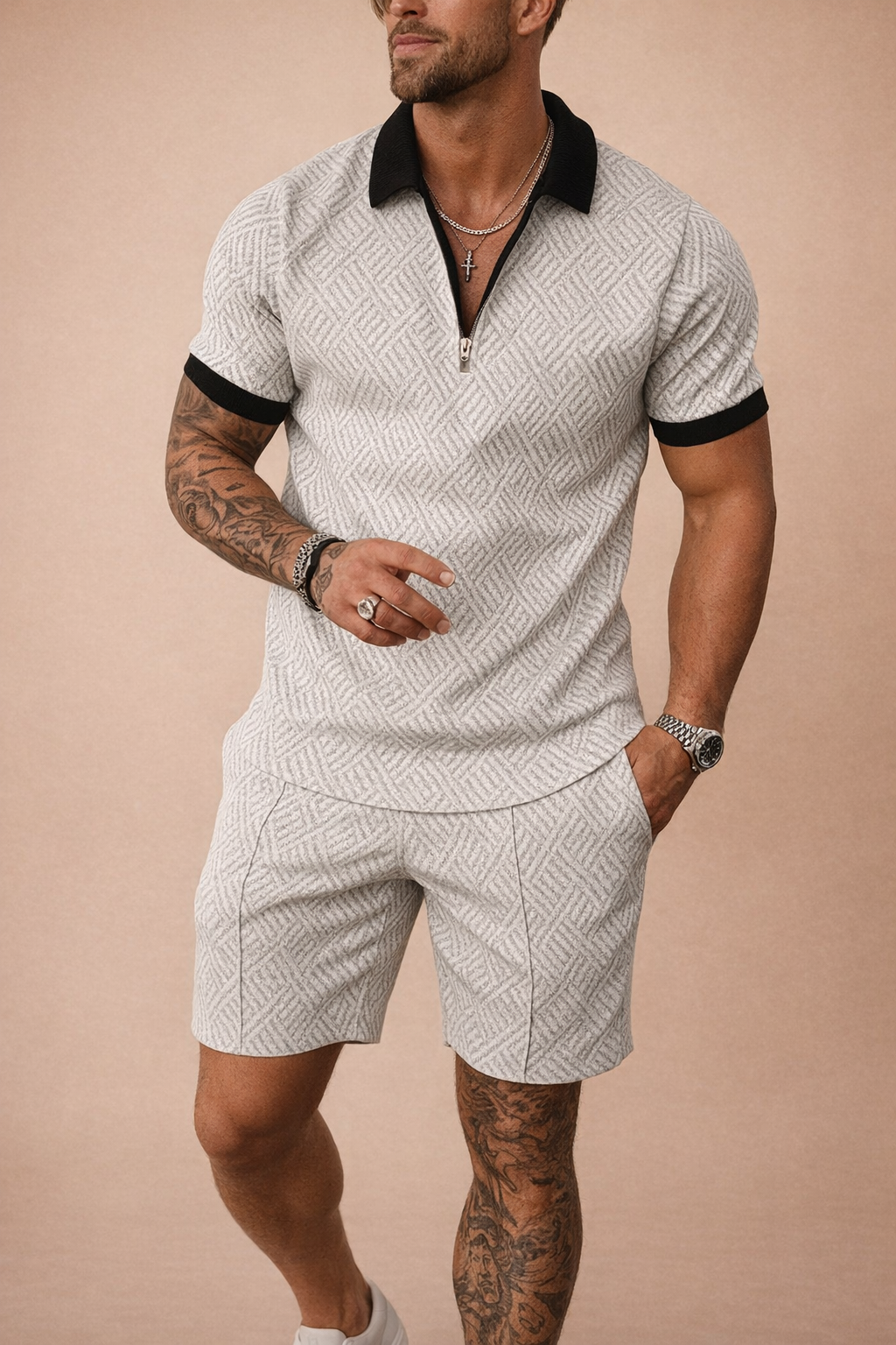 Warm weather men's apparel: a sophisticated collared polo shirt matched with crisp tailored shorts.