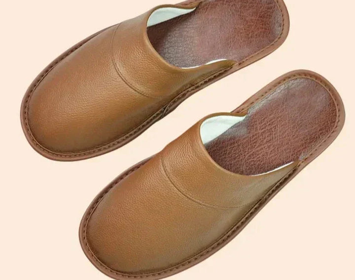 Premium men's leather house slippers, soft & warm, designed for ultimate indoor comfort.
