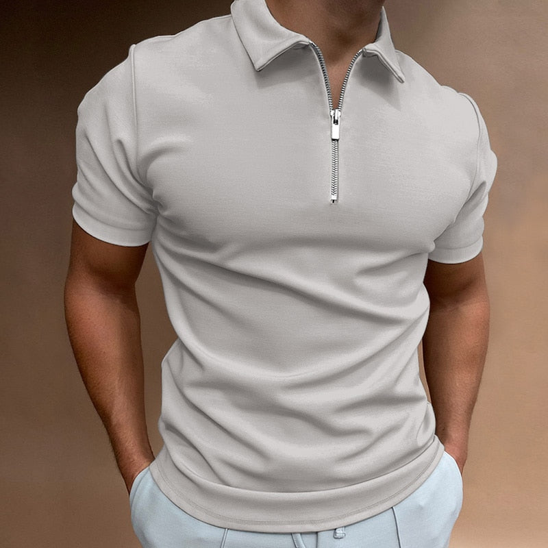 Fashionable men's fitted short-sleeve polo with a sleek zip collar, a modern take on classic casual wear.