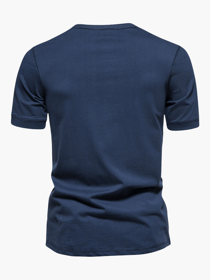 Essential summer men's short sleeve button shirt, lightweight & comfortable for warm weather.