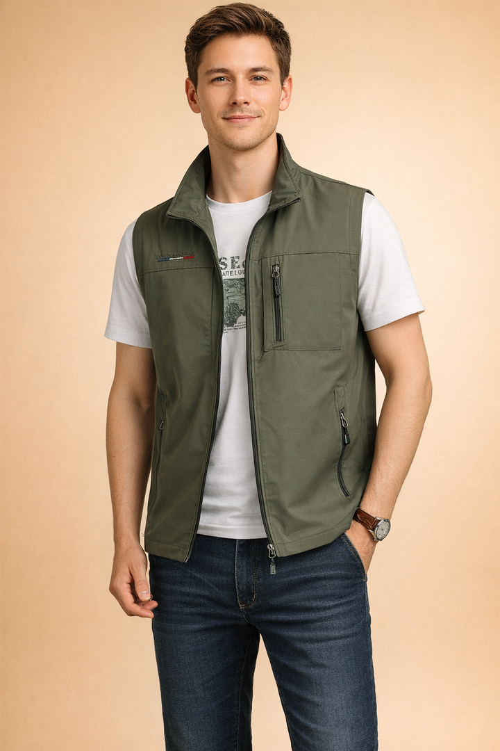 Sleek men's lightweight utility vest, perfect for casual layering; features secure zip pockets for essentials.