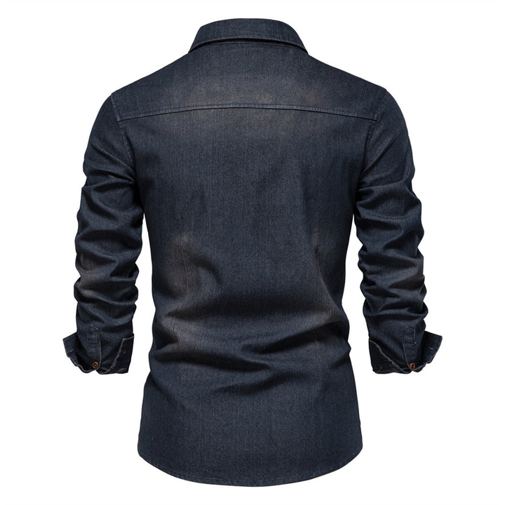 Close-up of Logan stretch cotton denim shirt, showing fabric texture & quality buttons.