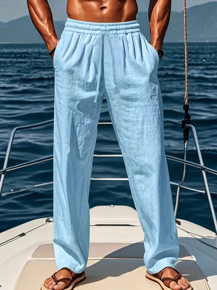 Breathable men's summer drawstring pants, offering loose fit comfort for warm weather and relaxed style.