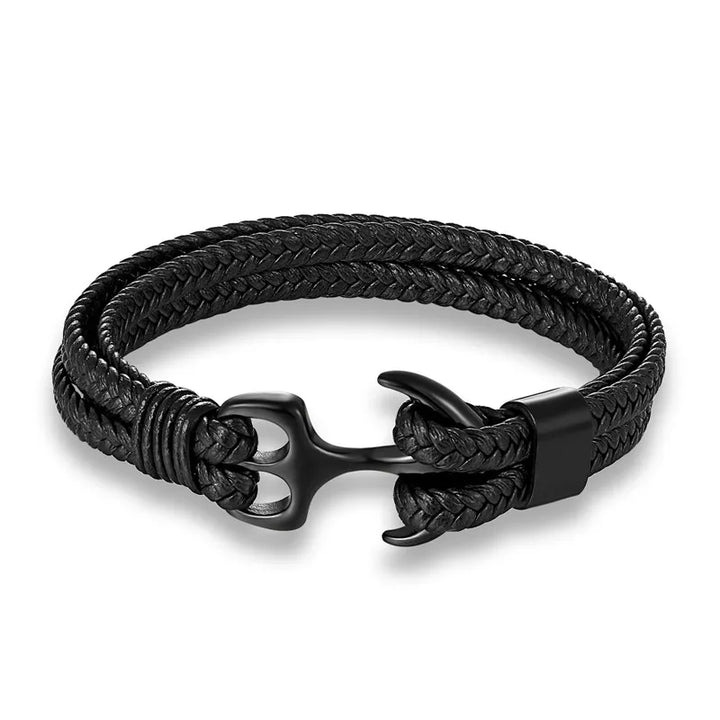 Durable men's genuine leather bracelet featuring a rugged stainless steel anchor charm. Maritime style.