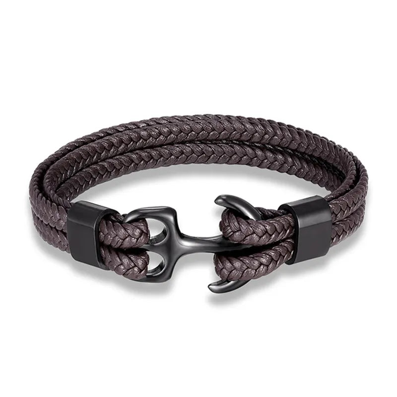Close-up: Detailed stainless steel anchor charm on a stylish men's black leather bracelet.