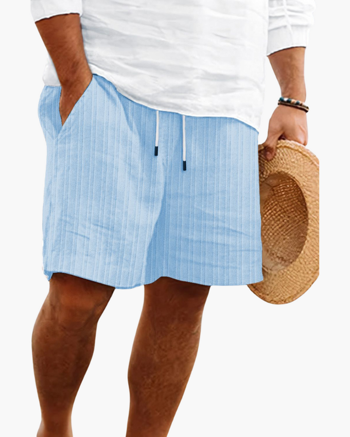 Modern men's relaxed fit drawstring shorts, lightweight & comfortable for summer adventures.