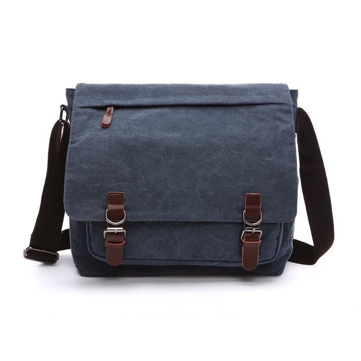 Spacious men's canvas crossbody bag, ideal for everyday carry, work, or travel, featuring durable construction.