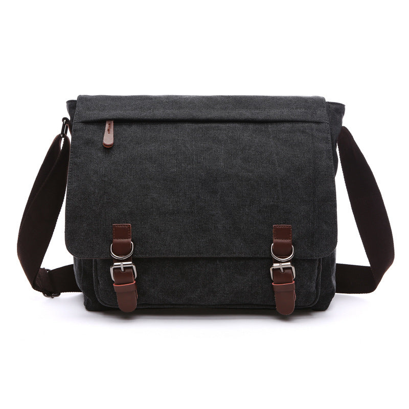 Unisex rugged canvas shoulder bag, perfect for everyday essentials, work, or travel, highlighting its sturdy material.