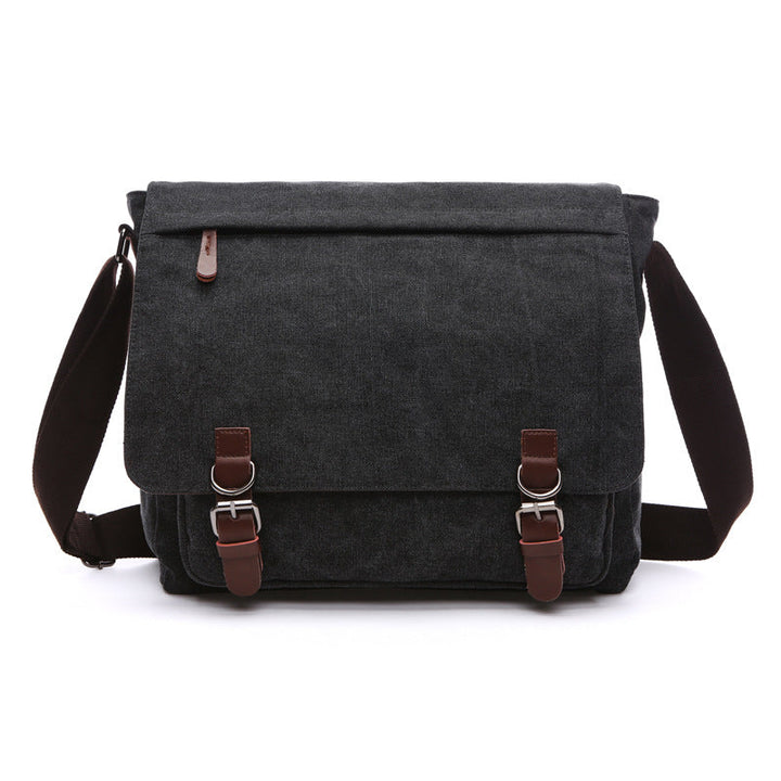 Unisex rugged canvas shoulder bag, perfect for everyday essentials, work, or travel, highlighting its sturdy material.