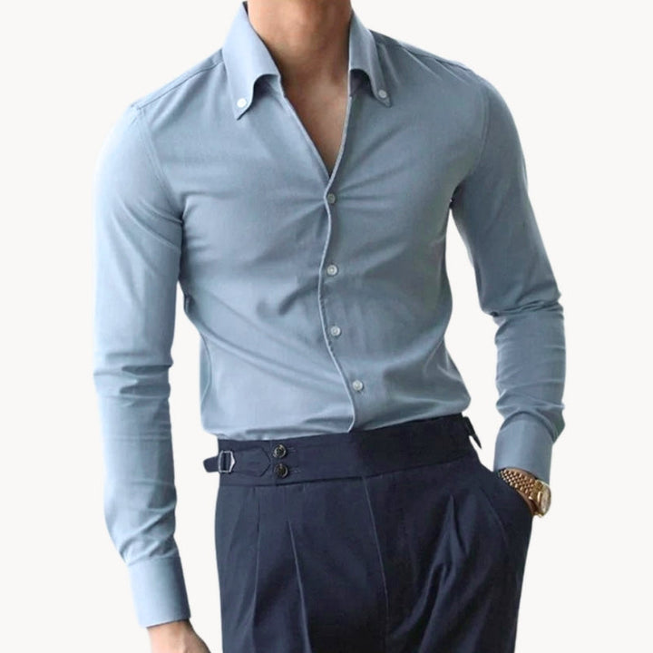 Men's slim fit long sleeve tight shirt in a modern style, ideal for business casual or formal wear.