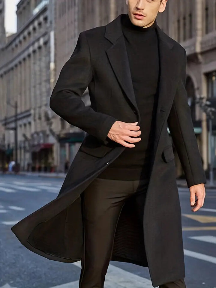 Stylish men's slim fit long trench coat, ideal classic outerwear for modern fall and winter fashion.