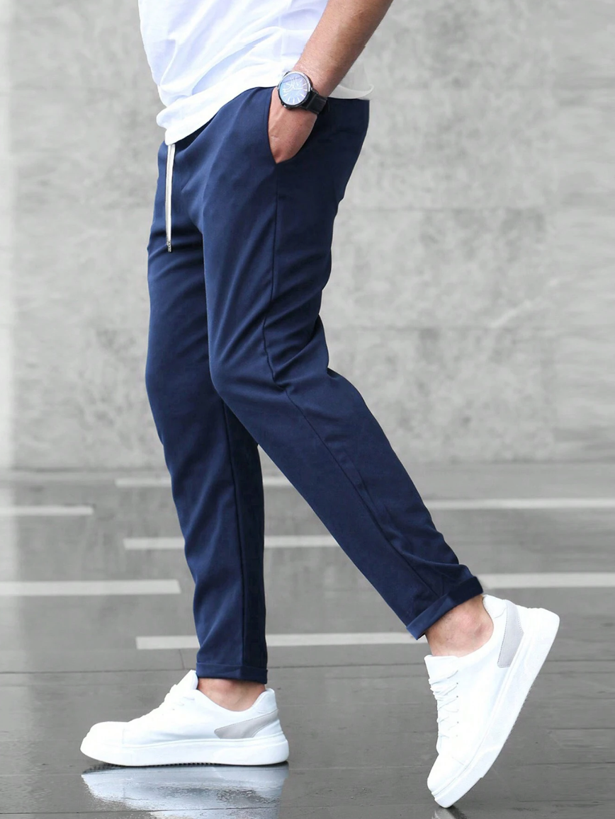 Stylish men's slim-fit stretch trousers for all-day comfort, perfect for work, meetings, or casual events.