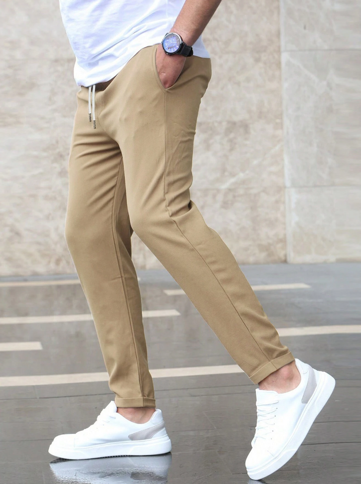 Men's business casual slim-fit stretch trousers, offering comfort and modern style for any occasion.